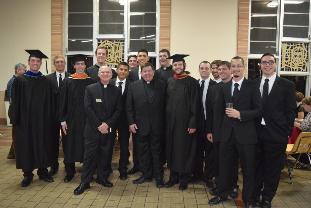 May 6, 2015 - Our seminarians William Augensen, Ralph D’Elia, Connor Penn, and Drew Woodke graduated with a Bachelor of Philosophy degree from St. John Vianney College Seminary in Miami. William, Ralph, Connor, and Drew will begin their studies at St. Vincent de Paul Regional Seminary in Boynton Beach in the fall. Please keep them in your prayers as they move on to this next step in their journey to the priesthood! Photo credit: Peg Augensen