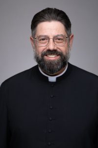 Rev. Justin P. Paskert